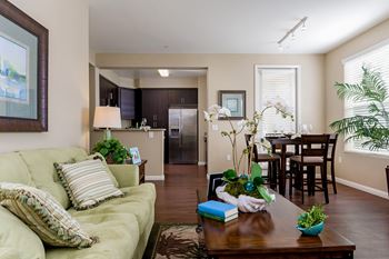 Wood-style flooring + carpeted bedrooms*
